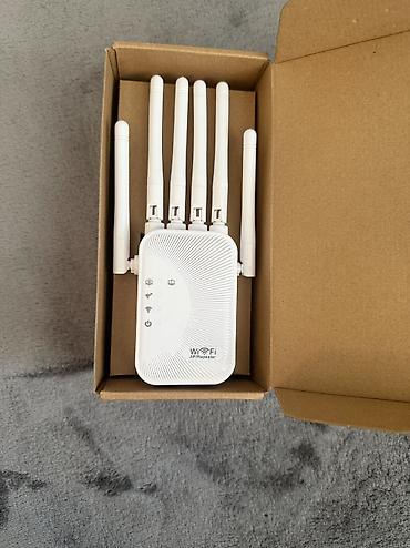 tp link ex520: Wi‑Fi siqnal gücləndiricisi / şəbəkə genişləndiricisi - WiFi 6 sürət — 5