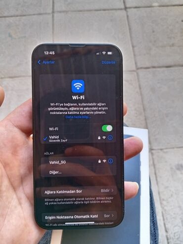 Apple iPhone: IPhone 13, Qara — 11