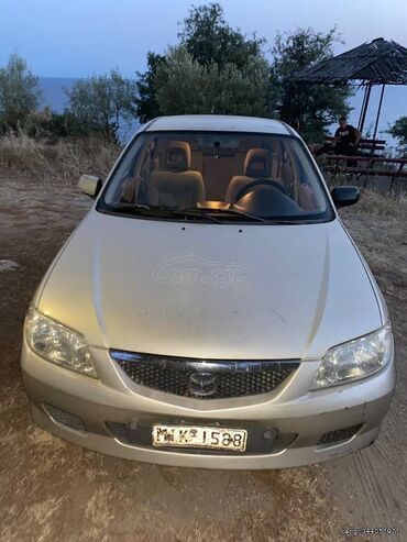 Used Cars: Mazda 323: 1.4 l | 2001 year MPV