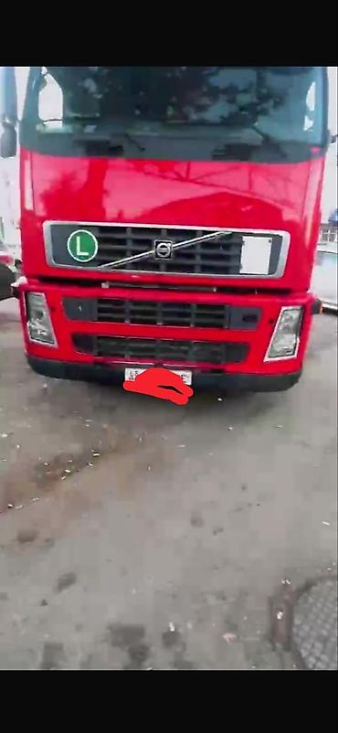 полик 124: Тягач, Volvo, 2002 г., Бортовой — 1
