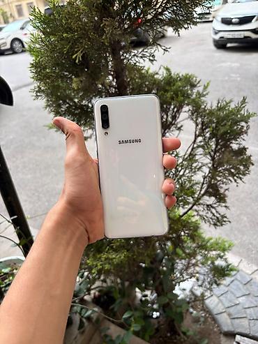 телефон fly f: Samsung Galaxy A50, 64 ГБ, цвет - Белый, Две SIM карты — 2