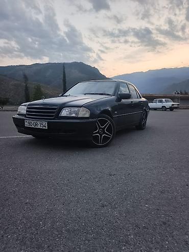 Mercedes-Benz: Mercedes-Benz C 240: 2.4 l | 1999 il Sedan — 4