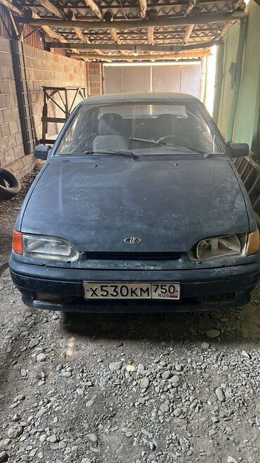 зимние шины на жигули: Автомобиль LADA 21099 седан синего цвета, оснащенный четырехдверным