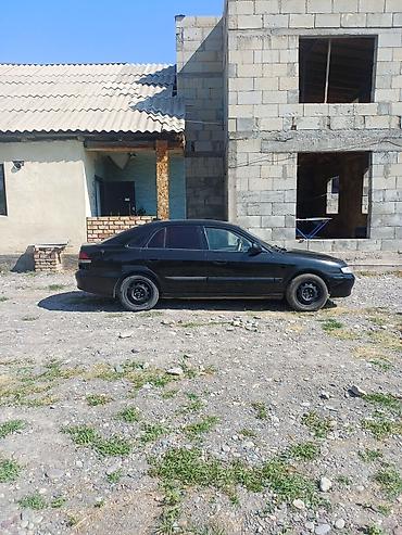 комбин: Mazda 626: 2000 г., 1.8 л, Механика, Бензин, Седан — 5
