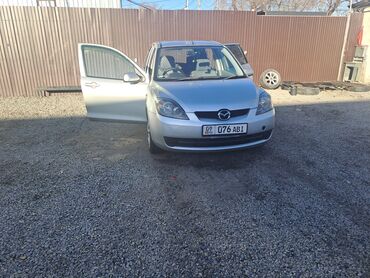 Mazda: Mazda Demio: 2005 г., 1.3 л, Автомат, Бензин, Седан