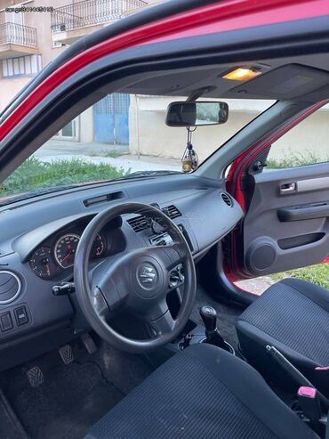 Suzuki: Suzuki Swift: 1.3 l. | 2009 έ. 150841 km. Χάτσμπακ — 6