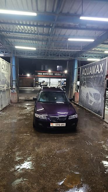 Mazda: Mazda 323: 2000 г., Универсал — 9