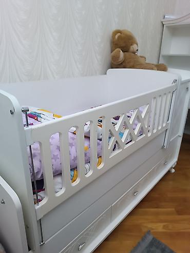 Beşiklər: Uşaq çarpayısı – modul tipli, ağ rəngdə Xüsusiyyətlər: - Yanları — 3