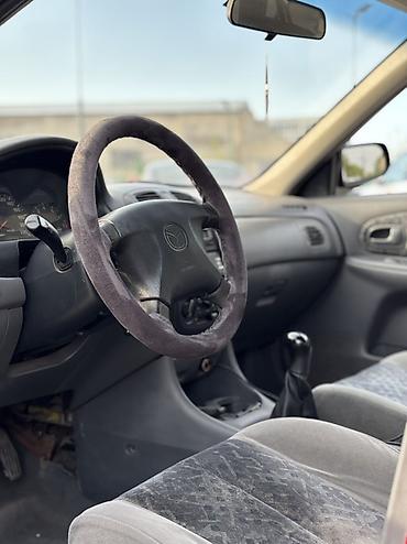 Mazda: Mazda 323: 1998 г., 1.5 л, Механика, Бензин, Универсал — 8