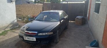 запчасти на опель вектра б: Mazda Cronos: 1996 г., 2 л, Механика, Бензин, Седан