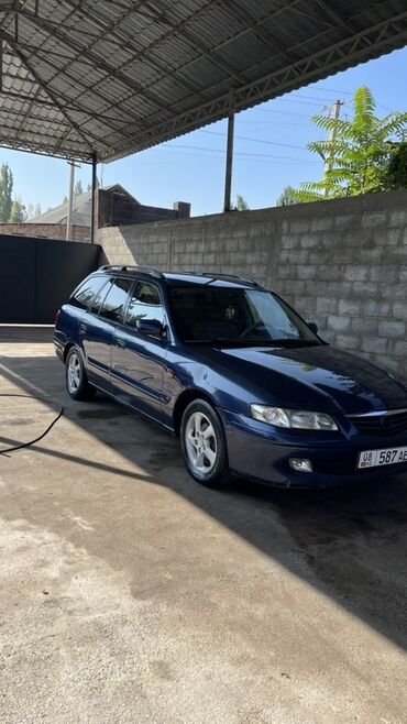 полик ош: Mazda 626: 2001 г., 2 л, Механика, Газ, Универсал
