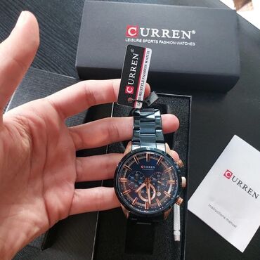 cib saatı: Curren original qol saatı. Yenidir pakofkada emblemli sekilde. Satis