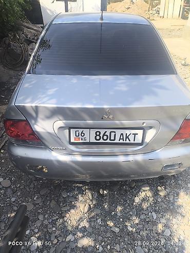 митсубиси эрв: Mitsubishi Lancer: 2004 г., 1.6 л, Автомат, Бензин, Седан — 7