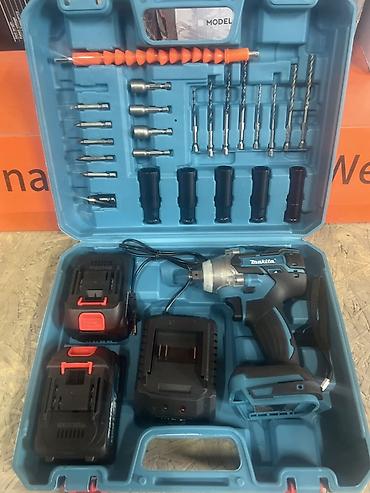 Аккумуляторный ударный гайковерт Makita в кейсе — комплект для монтажа