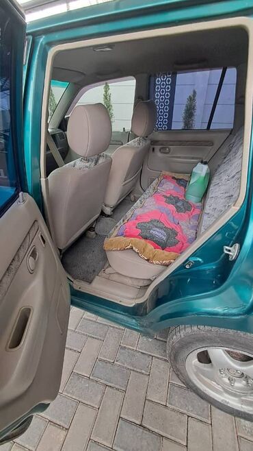 Mazda: Mazda Demio: 2000 г., 1.3 л, Механика, Гибрид, Хэтчбэк — 2