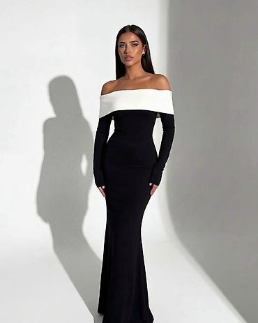 Elegantna večernja haljina – crno-bela

Haljina: 2.600dinara 
Likra