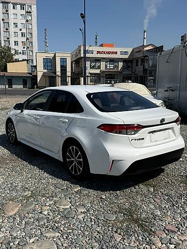 Продажа авто: Toyota Corolla: 2023 г., 1.8 л, Автомат, Гибрид, Седан — 6