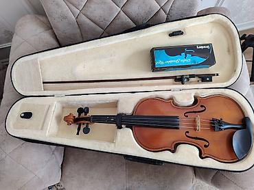 Skripkalar: Skripka dəsti Tərkib: - Tam ölçülü klassik skripka (4/4) - Yay - — 10
