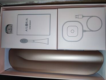proljetne jakne c: Elektricna cetkica za zube,novo,sadrzi elektricni punjac-postolje,dva