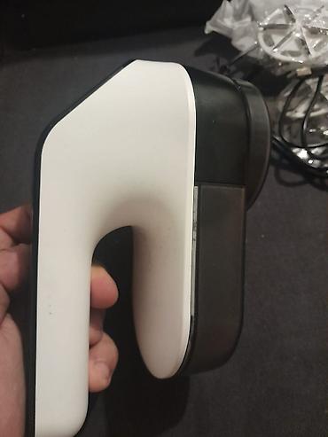 Ostali kućni aparati: Električni aparat za uklanjanje mucica i dlačica sa odeće (lint — 9