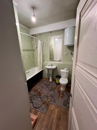 купить дом в иссык куле: 100 м², 3 комнаты, Парковка, Забор, огорожен