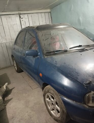 машина каракол: Mazda 121: 1991 г., 1.5 л, Механика, Бензин, Кабриолет