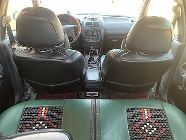 буу донголок chevrolet malibu шина: Mitsubishi Carisma: 1998 г., Седан — 6