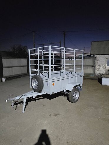 Qoşqular: Yük qoşqusu – tək oxlu, yanları hündür, karkaslı və brezent örtüklü - — 10