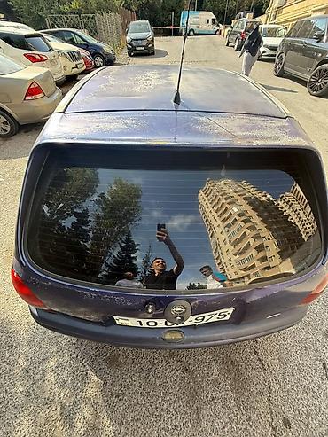 melber 13: Marka–Opel Model–Vita Buraxılış ili–1995 Ban növü–Sedan Rəngi:tünd göy — 10