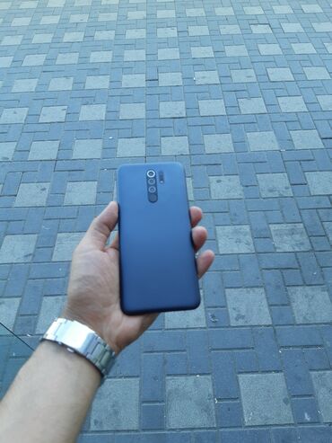 telefon fly fs527: Xiaomi Redmi 9, 64 ГБ, цвет - Синий, 
 Сенсорный