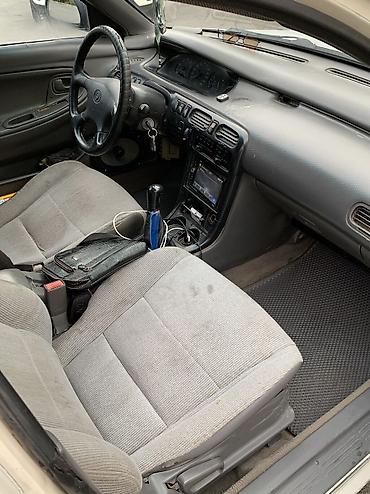 90: Mazda Cronos: 1993 г., 2 л, Механика, Бензин, Лифтбек — 5