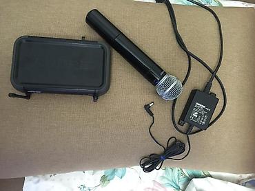 mikrofon tutucu: Shure pgx24/sm58 original.Mikrofon ella isleyir.yeni deyə — 4