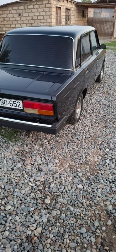 Kommersiya nəqliyyat vasitələri: Model: LADA 2107 (Qara rəng) Xüsusiyyətlər: - Kuzov: Sedan, qara