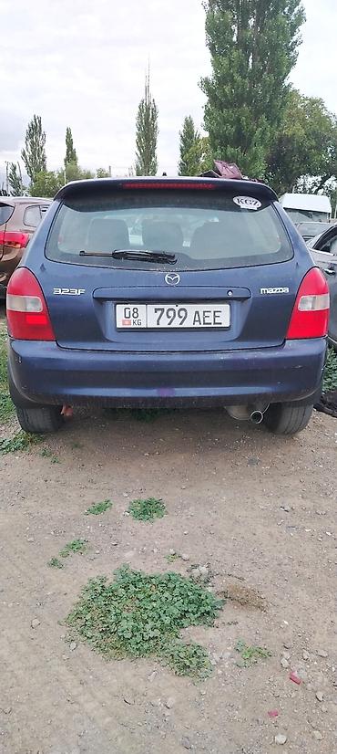 кажы сай: Mazda 323: 2001 г., 1.6 л, Кол менен иштөөчү, Бензин, Универсал — 3