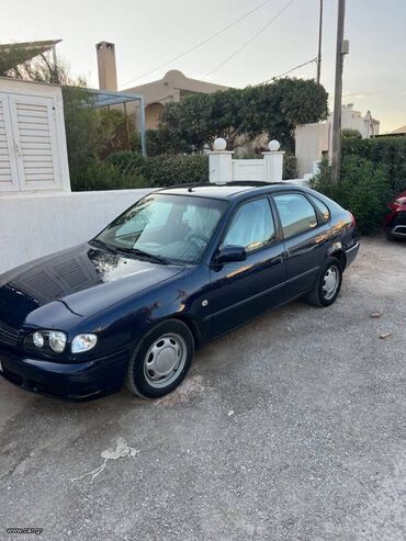 Transport: Toyota Corolla: 1.4 l | 2000 year Hatchback