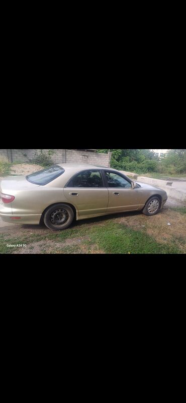 тойота приус с: Mazda Millenia: 1999 г., 2 л, Автомат, Бензин, Седан