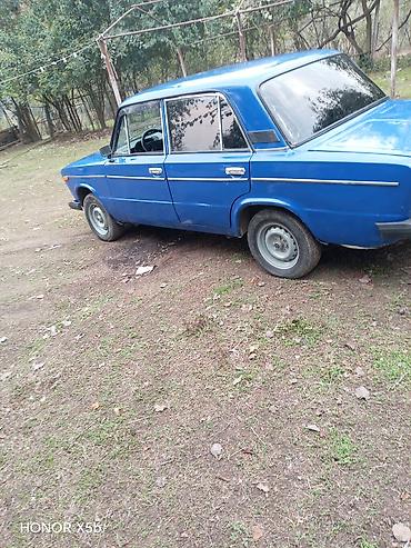 canqan uni z: VAZ 2106, mavi rəng. Klassik sedan gövdə, xrom ön barmaqlıq və dəyirmi — 6