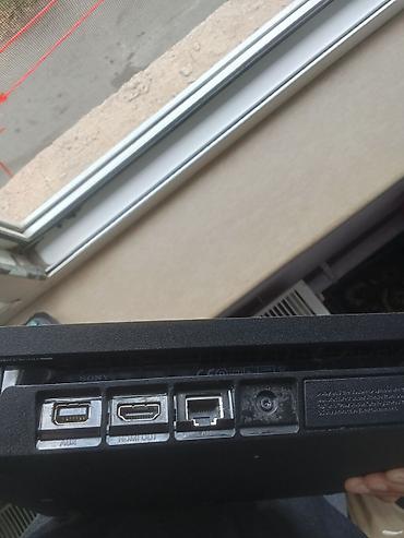 pse 4: PlayStation 4 Slim oyun konsolu + 2 ədəd DualShock 4 idarəetmə pultu — 6