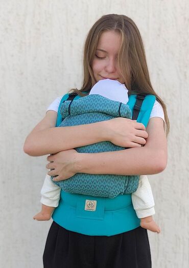 сумка попит: Слинг-рюкзак мини-люкс разработан фирмой ТеддиСлинг для ношения деток