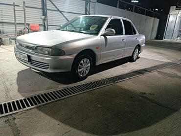 Mitsubishi: Mitsubishi Lancer: 1996 г., 1.3 л, Механика, Бензин, Седан