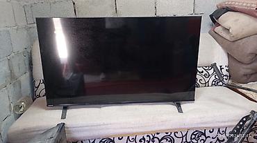 Телевизор Toshiba, диагональ около 43–50". Плоская LED‑панель с — 3