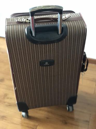 Чемоданы: Чемодан, Материал: Полиэстер, Большой (более 70 л), Вращающиеся колеса на 360° — 4