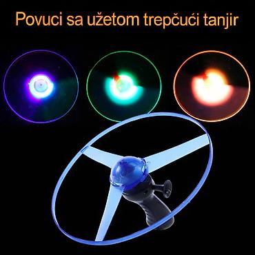 Ostalo: Nov svetleći leteći disk. Ima tri LED boje crvena, zelena i plava — 8