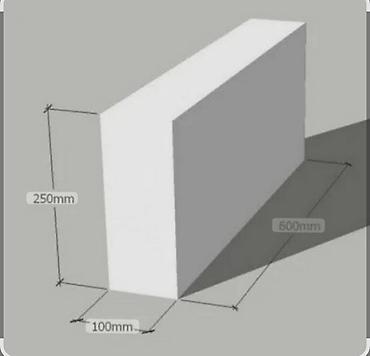 daş kubik ölçüsü: Ağ rəngli tikinti bloku – ölçülər: 600 mm (uzunluq) x 250 mm — 1