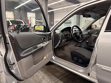 Mazda: Mazda 323: 2003 г., 1.6 л, Механика, Бензин, Универсал — 12