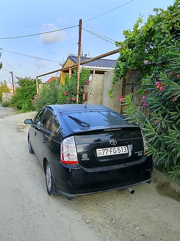 prius diskləri: Toyota Prius, 2-ci nəsil, hibrid. - Kuzov: hetçbek, qara rəng - Güc — 1