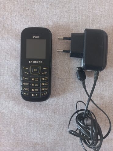 сколько стоит айфон 15 в баку: Samsung E210, rəng - Qara, İki sim kartlı