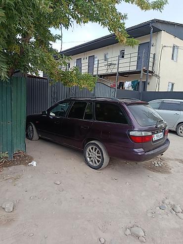 Mazda: Mazda 323: 2000 г., Универсал — 6