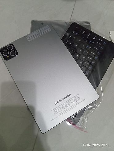 Digər planşetlər: CRELANDER T40 10.1" Android Tablet PC Xüsusiyyətlər: - 10.1 düym — 6