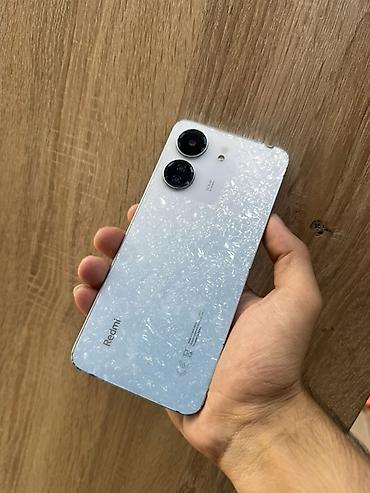 Мобильные телефоны и аксессуары: Redmi 13C, 128 ГБ, цвет - Голубой, Отпечаток пальца, Face ID — 4